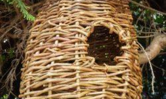 Small willow birdhouse with small round hole