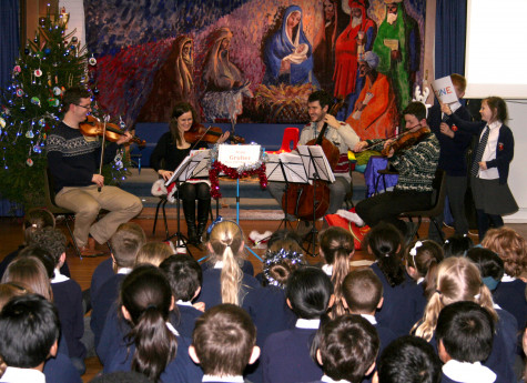 Brodowski Quartet playing to students at Christmas time