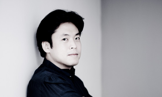 Sunwook Kim leans against a wall