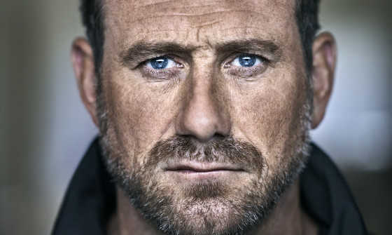 Jason Fox looks sternly and deeply into the camera.