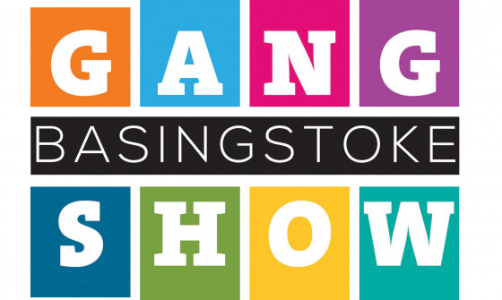 Basingstoke Gang Show is written in rainbow colours.