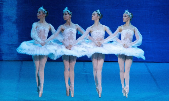 Four ballet dancers in a line