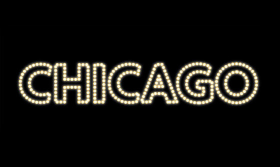 'Chicago' is spelt out in bright stage lights.