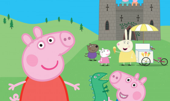 Peppa and George stand in front of a castle